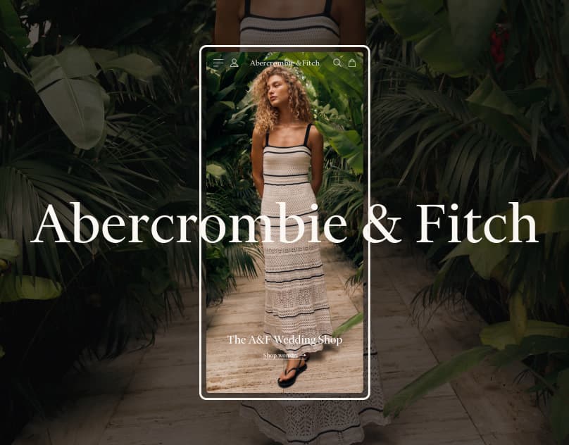 Fashion website concept with a model in a light dress framed by dark tropical foliage and a compact shopping navigation.